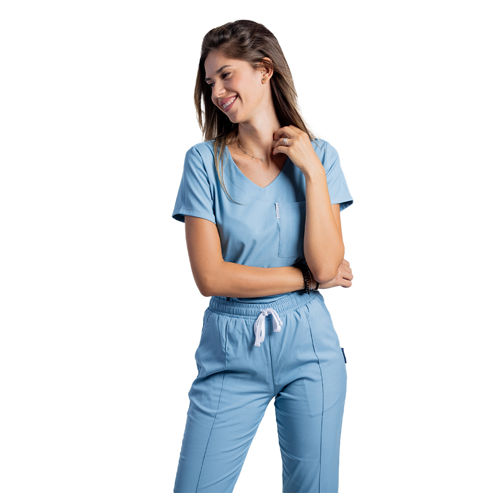 Tuta medica elasticizzata blu polvere con blusa a V e pantalone con cordino ed elastico